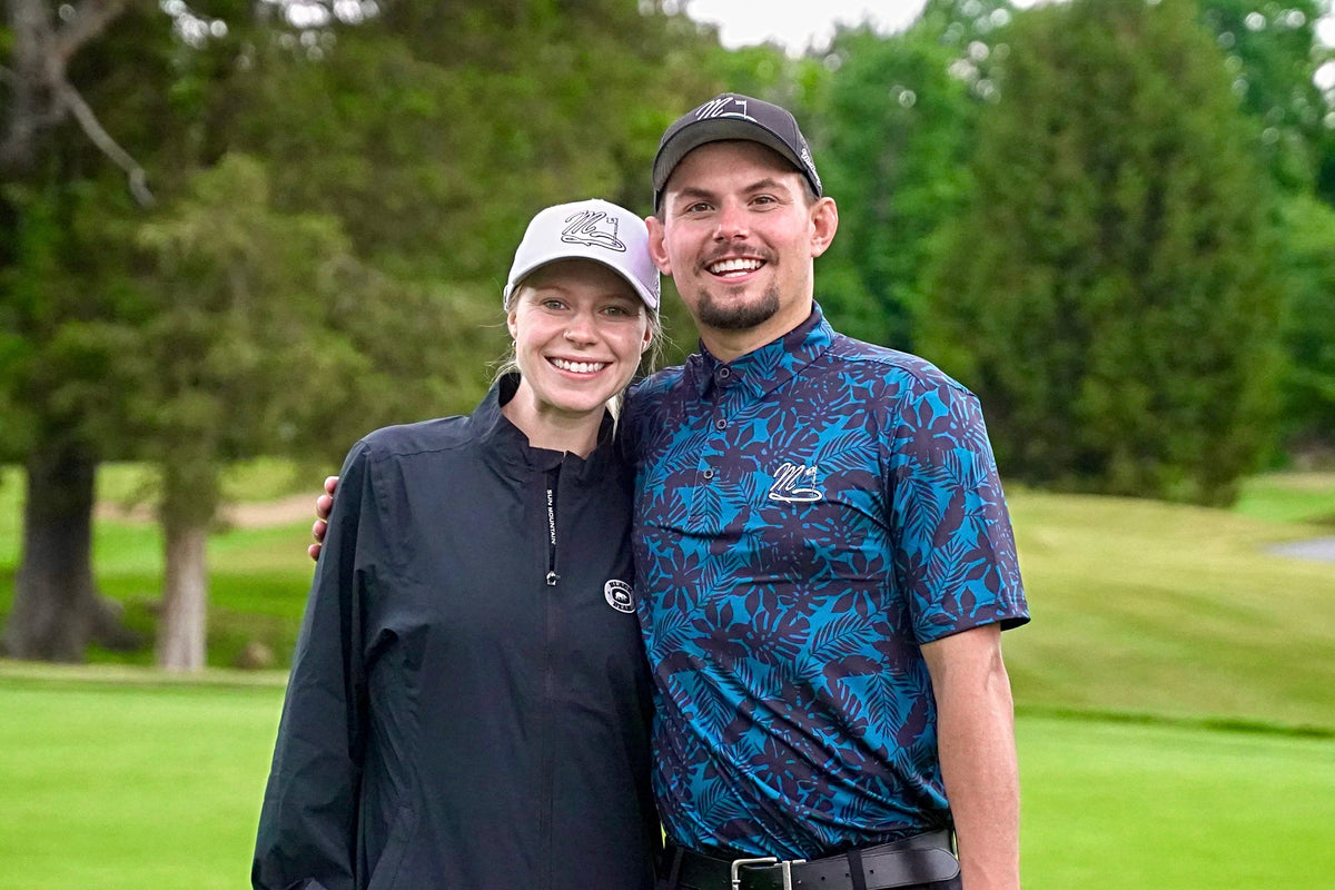 Golfers teeing off at Swing For A Cure